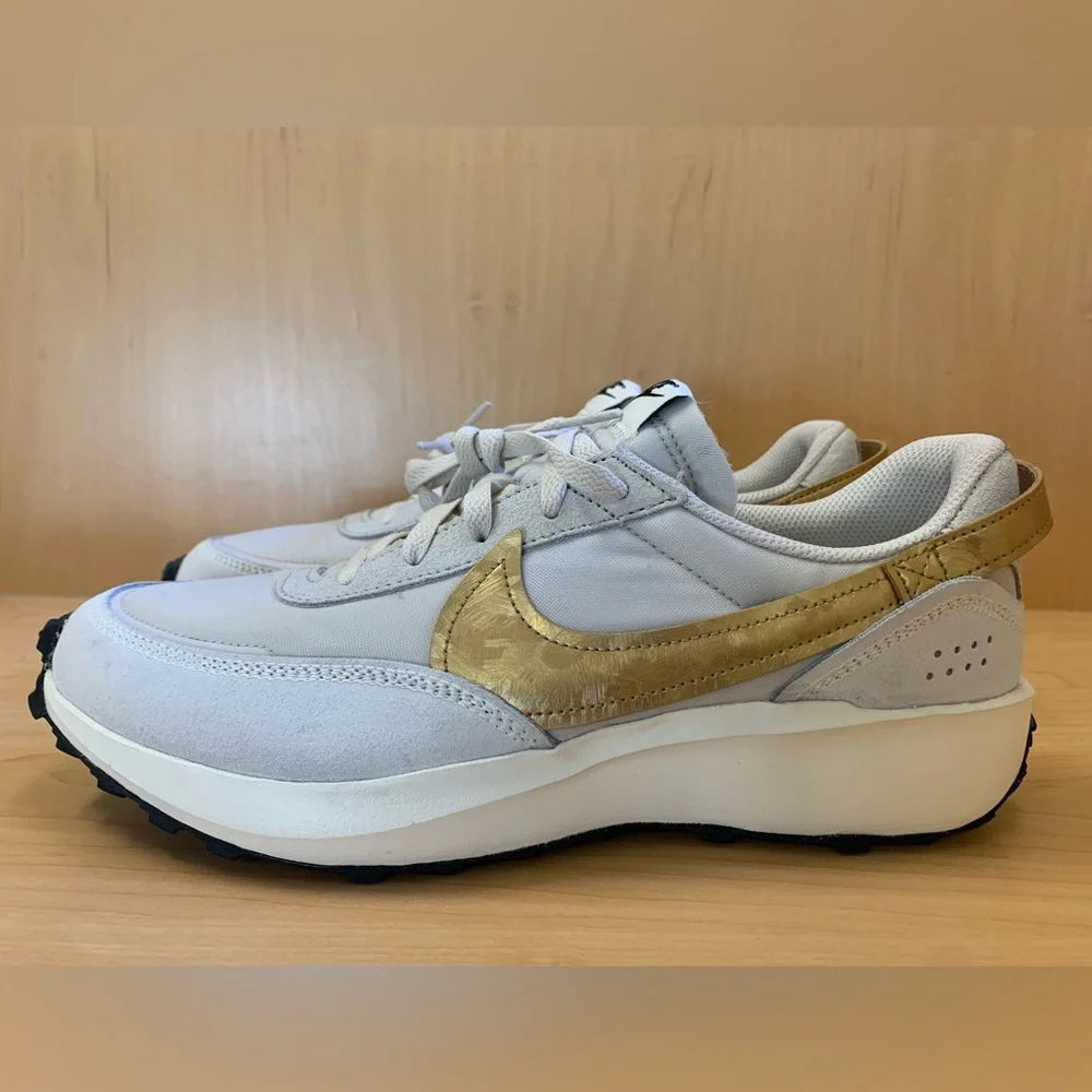 Nike Women's Light Gray Sneakers with Mustard Swoosh